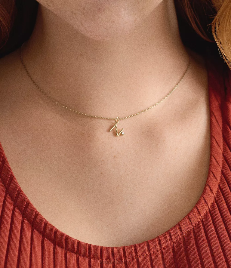 Fossil 6J041300 altın tonu paslanmaz çelik ilk kolye kolye takı kadınlar